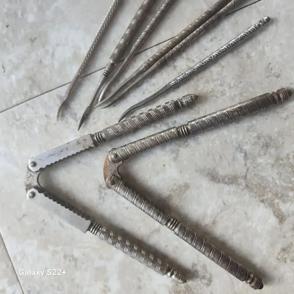 Silver metal Vintage Embossed Nutcracker & Six Picks set